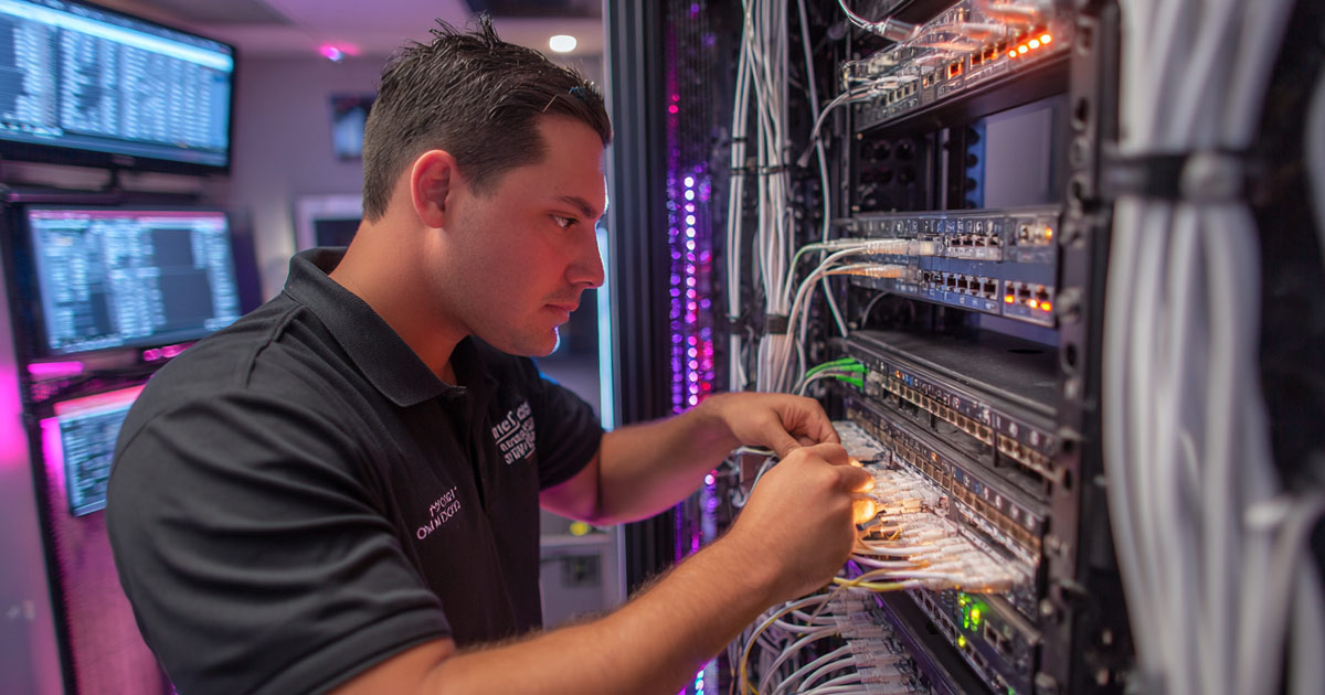 Business network installation in a modern Hollywood FL office with ethernet switches and wireless access points